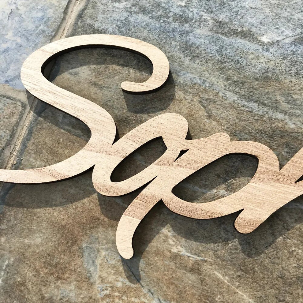 logo personnalisé en bois pour boutique