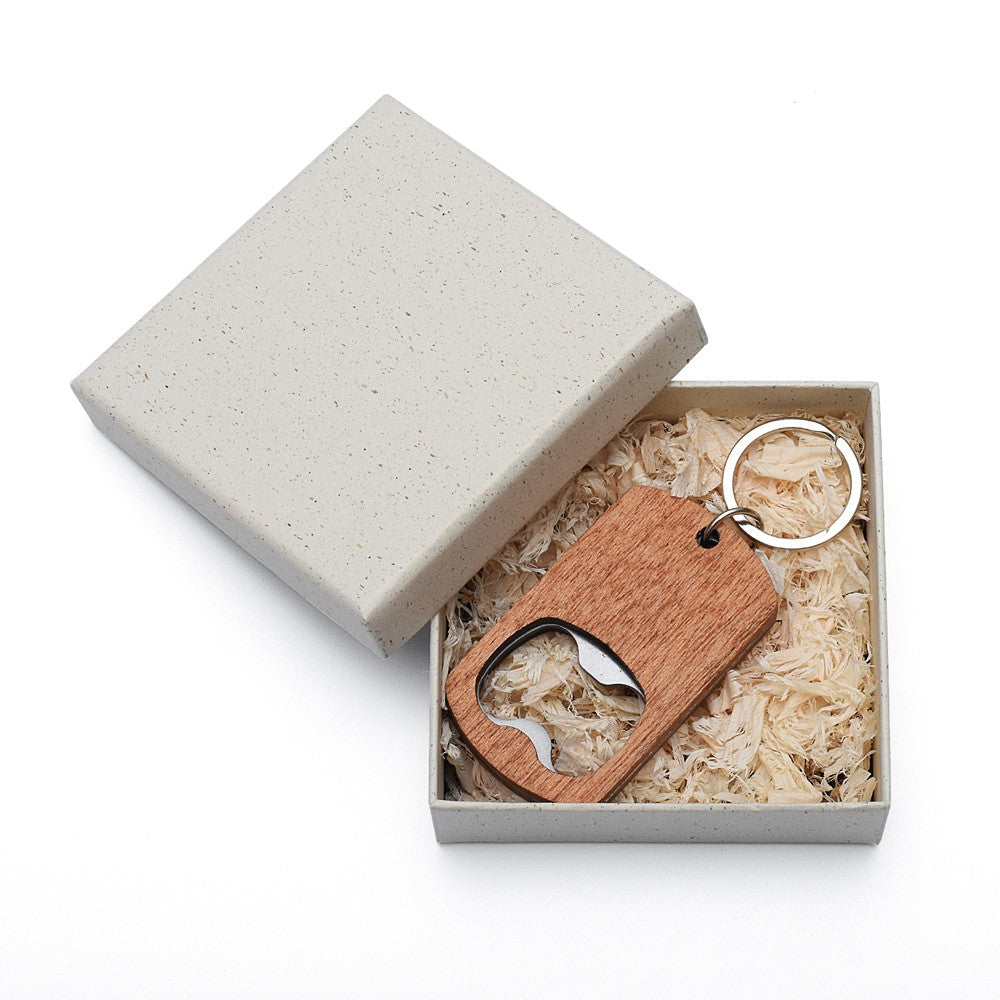 Porte-clés en bois gravé avec décapsuleur