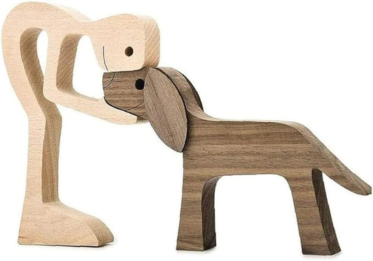 Sculpture artisanale en bois homme et chiots